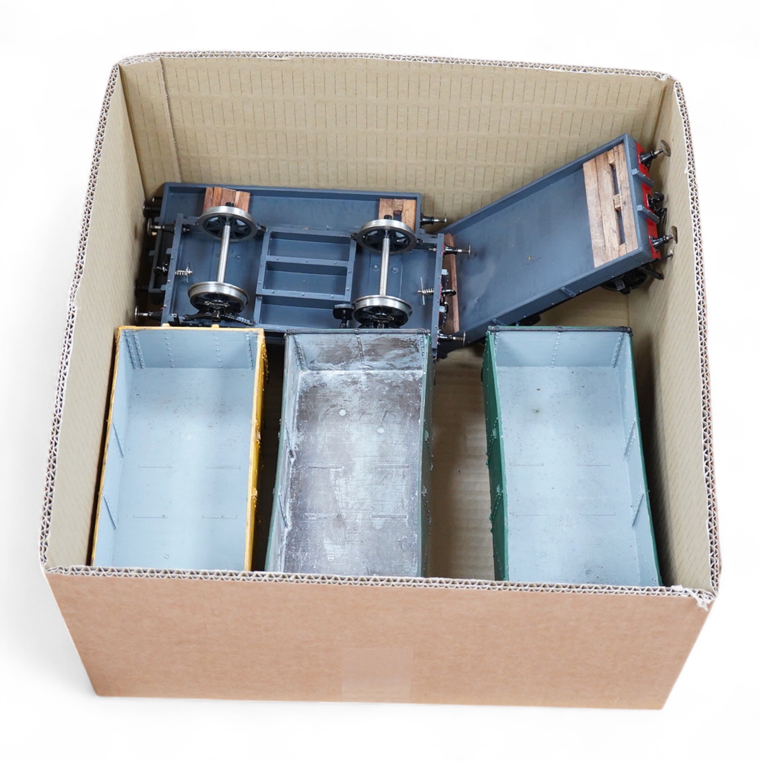 Six Gauge 3 model Railway freight wagons; 3 flats and 3 opens all built from Mike Williams resin kits, well constructed and painted to a reasonable standard with some weathering, etc.